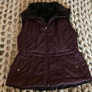 Ladies reversible vest. Eggplant color. Inside (reverse) is faux black fur.